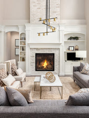 Calumet 9 Light 36" Chandelier in Matte Black + Olde Brass in a room setting