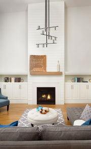 Calumet 9 Light 36" Chandelier in Matte Black + Polished Nickel in a room setting