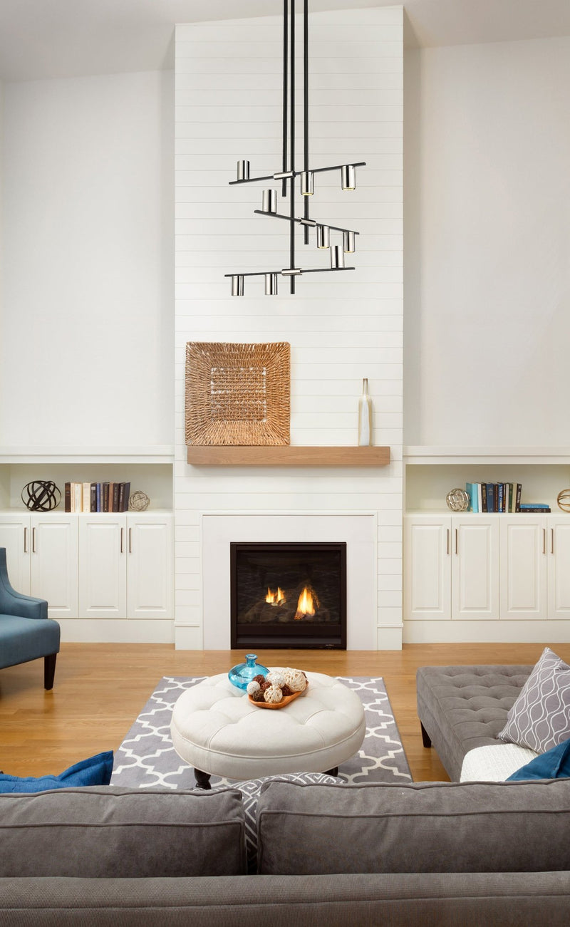 Calumet 9 Light 36" Chandelier in Matte Black + Polished Nickel in a room setting