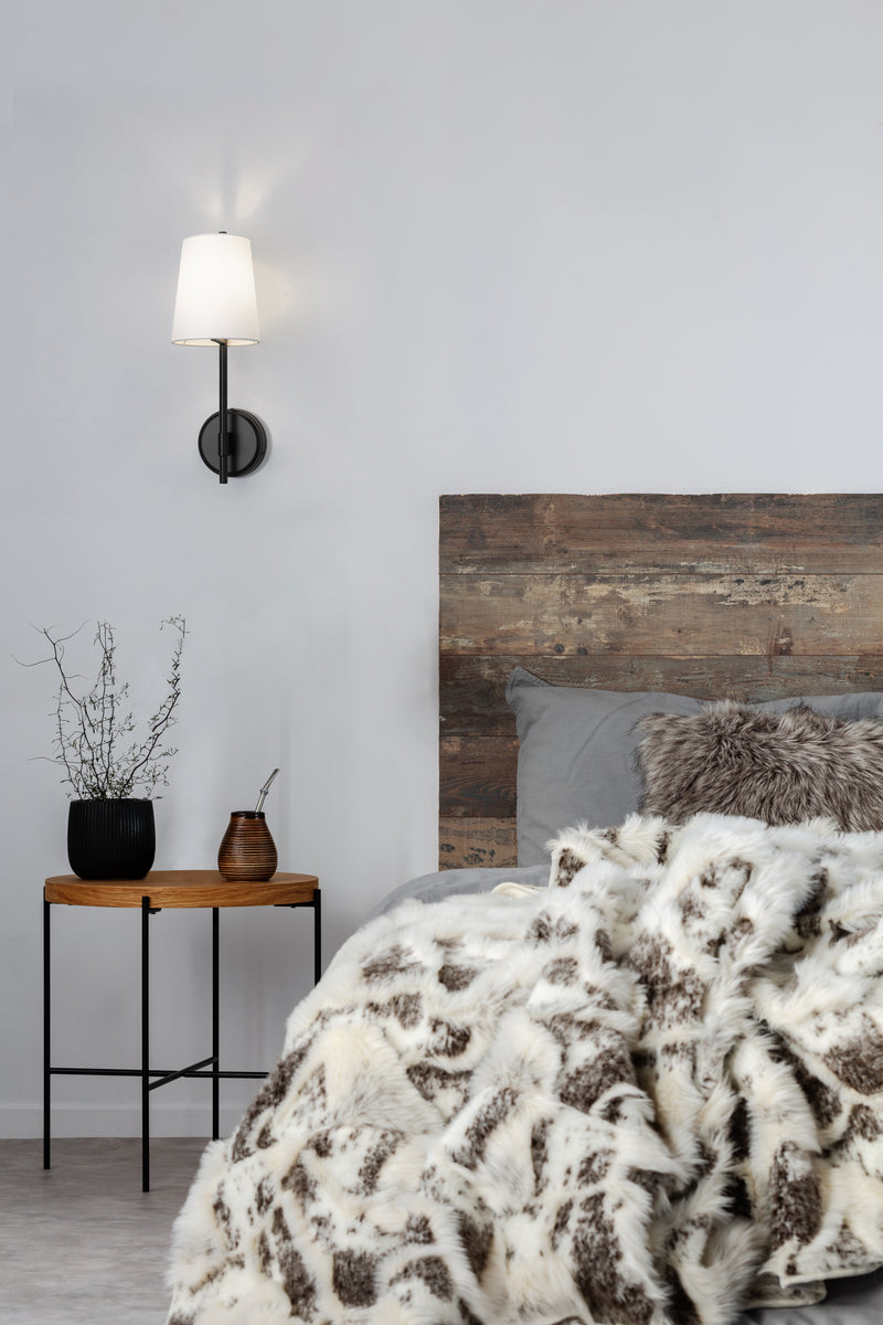 Winward 1 Light 6" Wall Sconce in Matte Black in a room setting