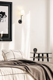 Winward 1 Light 6" Wall Sconce in Matte Black in a room setting