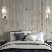 Winward 1 Light 6" Wall Sconce in Polished Nickel in a room setting