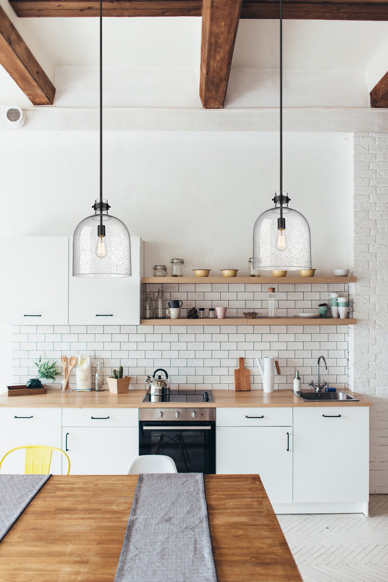 Pearson 1 Light Pendant, 16-16.5" Tall in Matte Black in a room setting