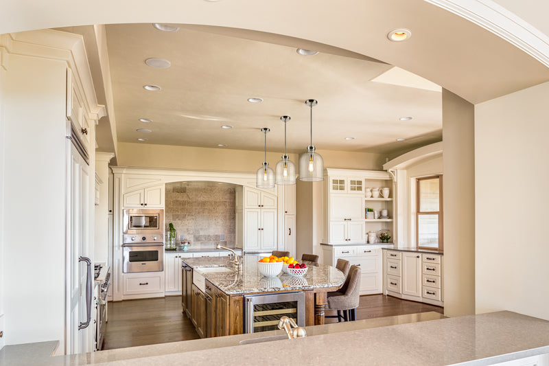 Pearson 1 Light Pendant, 13-13.5" Tall in Brushed Nickel in a room setting