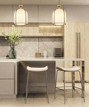 Pearson 1 Light Pendant, 13-13.5" Tall in Rubbed Brass in a room setting
