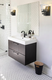 Lauren 1 Light 5" Wall Sconce in Matte Black in a room setting