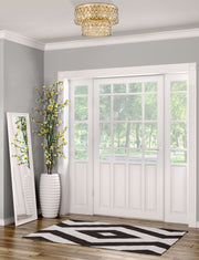 Dealey 9 Light 20" Flush Mount in Heirloom Brass in a room setting