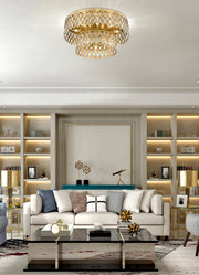 Dealey 12 Light 24" Flush Mount in Heirloom Brass in a room setting