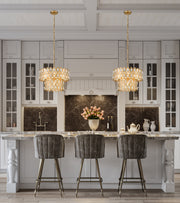 Dealey 5 Light 15.75" Pendant in Heirloom Brass in a room setting