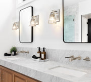 Lyna 1 Light 5" Wall Sconce in Brushed Nickel in a room setting