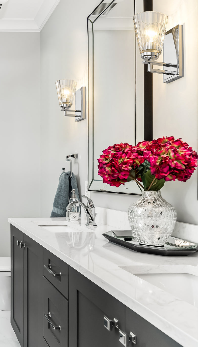 Lyna 1 Light 5" Wall Sconce in Chrome in a room setting