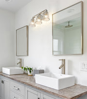 Lyna 3 Light 22" Vanity in Brushed Nickel in a room setting