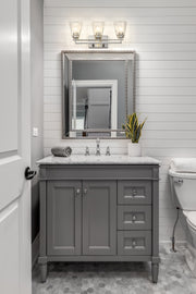 Lyna 3 Light 22" Vanity in Brushed Nickel in a room setting