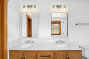 Lyna 3 Light 22" Vanity in Chrome in a room setting