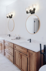 Lyna 3 Light 22" Vanity in Matte Black in a room setting
