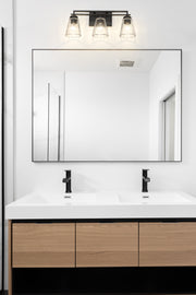 Lyna 3 Light 22" Vanity in Matte Black in a room setting