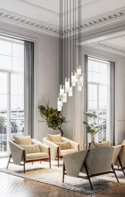 Alton 11 Light 24" Pendant in Brushed Nickel in a room setting