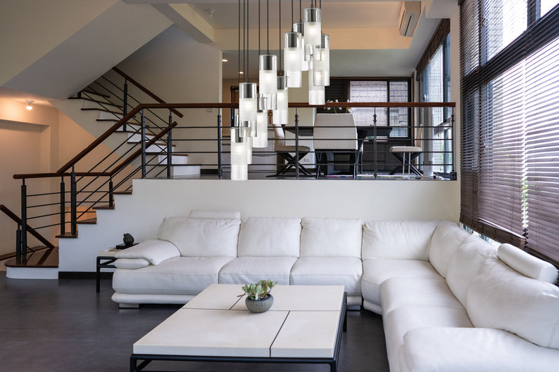 Alton 11 Light 24" Pendant in Matte Black in a room setting