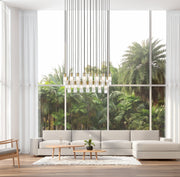 Alton 23 Light 54" Linear Pendant in Modern Gold in a room setting