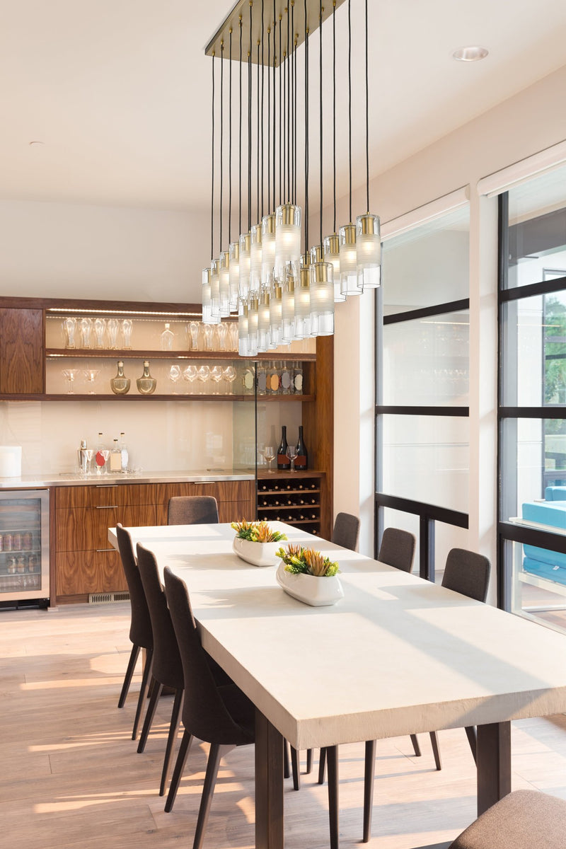 Alton 23 Light 54" Linear Pendant in Modern Gold in a room setting