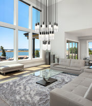 Alton 27 Light 36" Pendant in Matte Black in a room setting