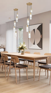 Alton 5 Light 12" Pendant in Modern Gold in a room setting