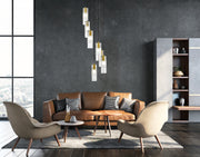 Alton 7 Light 18" Pendant in Modern Gold in a room setting