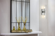 Titus 2 Light 4.5" Wall Sconce in Chrome in a room setting