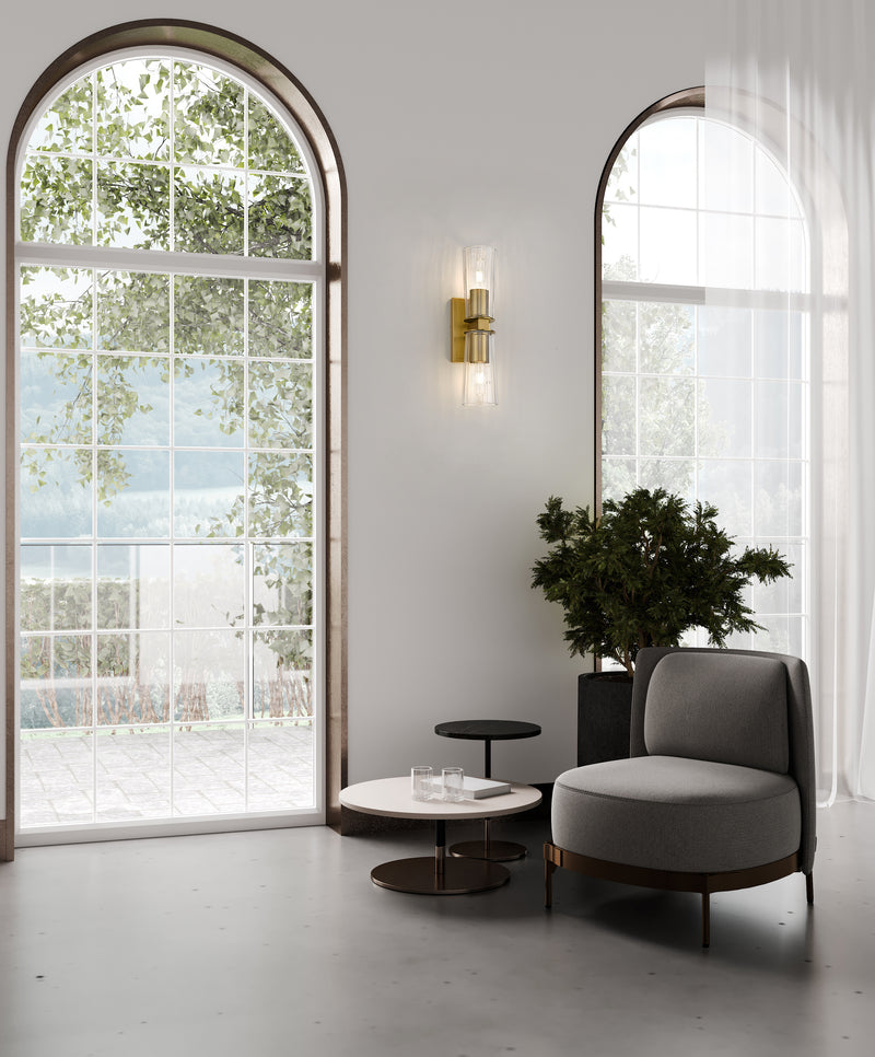 Titus 2 Light 4.5" Wall Sconce in Modern Gold in a room setting