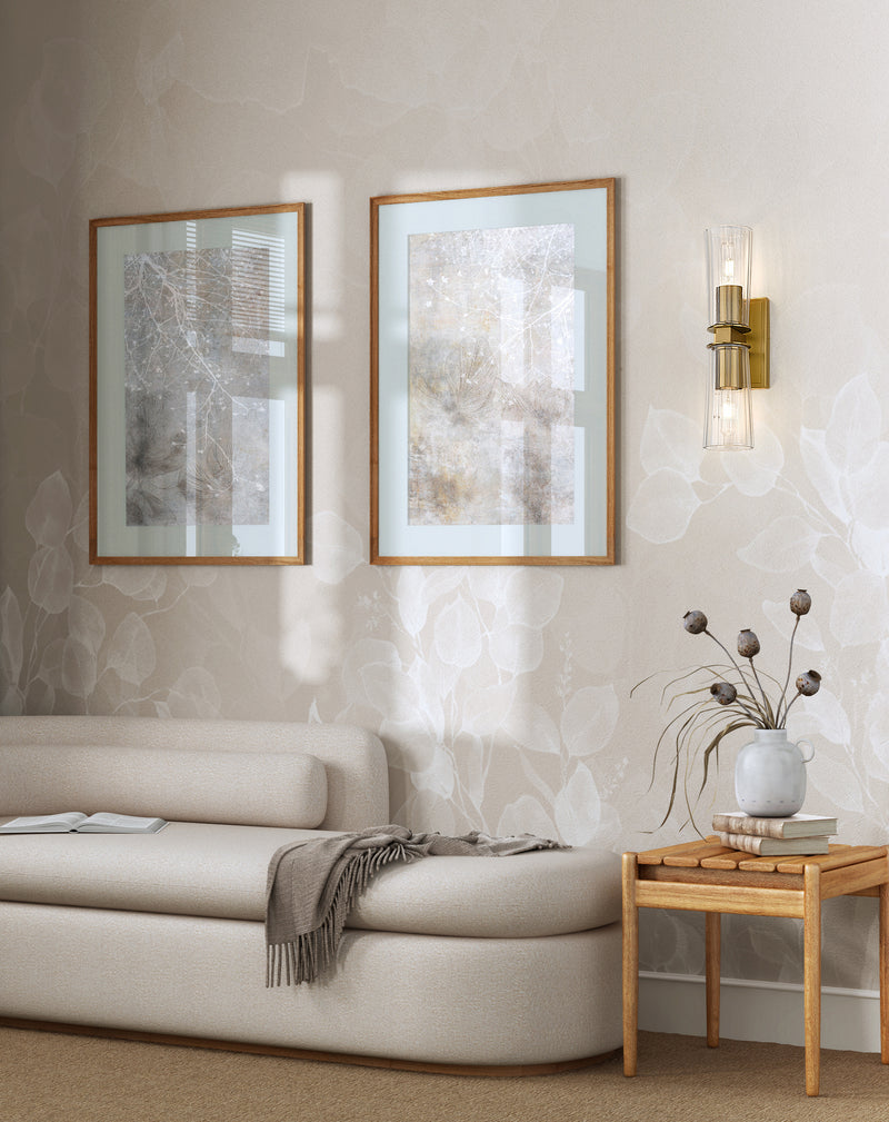 Titus 2 Light 4.5" Wall Sconce in Modern Gold in a room setting