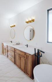 Titus 3 Light 24" Vanity in Modern Gold in a room setting