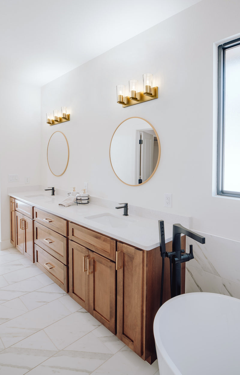 Titus 3 Light 24" Vanity in Modern Gold in a room setting