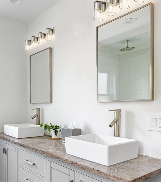 Titus 4 Light 32" Vanity in Brushed Nickel in a room setting
