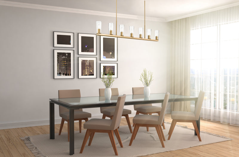 Titus 7 Light 63.5" Linear Pendant in Modern Gold in a room setting