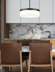 Renaud 1 Light 13" Pendant in Matte Black in a room setting