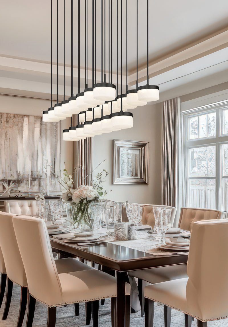 Renaud 23 Light 58.75" Linear Pendant in Matte Black in a room setting