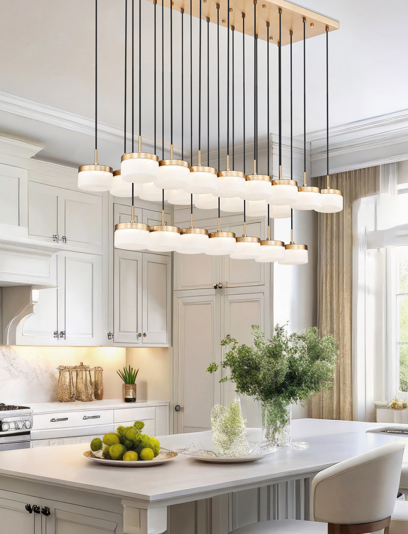 Renaud 23 Light 58.75" Linear Pendant in Modern Gold in a room setting