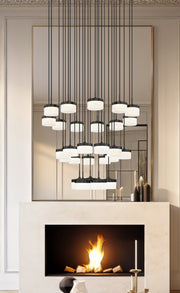 Renaud 27 Light 40.75" Pendant in Matte Black in a room setting