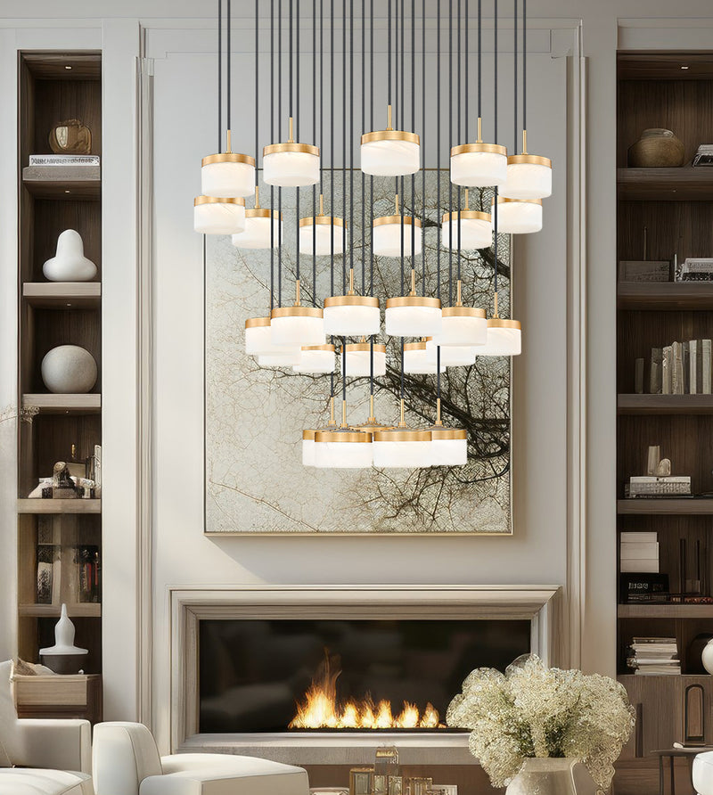 Renaud 27 Light 40.75" Pendant in Modern Gold in a room setting