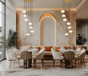 Renaud 7 Light 21" Pendant in Modern Gold in a room setting