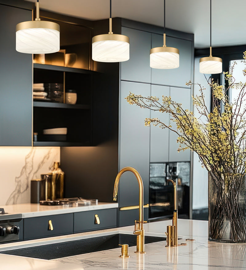 Renaud 1 Light 6.75" Pendant in Modern Gold in a room setting