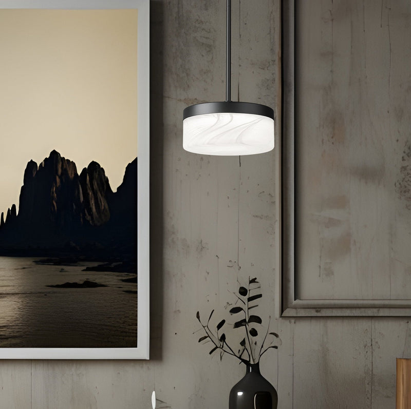 Renaud 1 Light 9.25" Pendant in Matte Black in a room setting