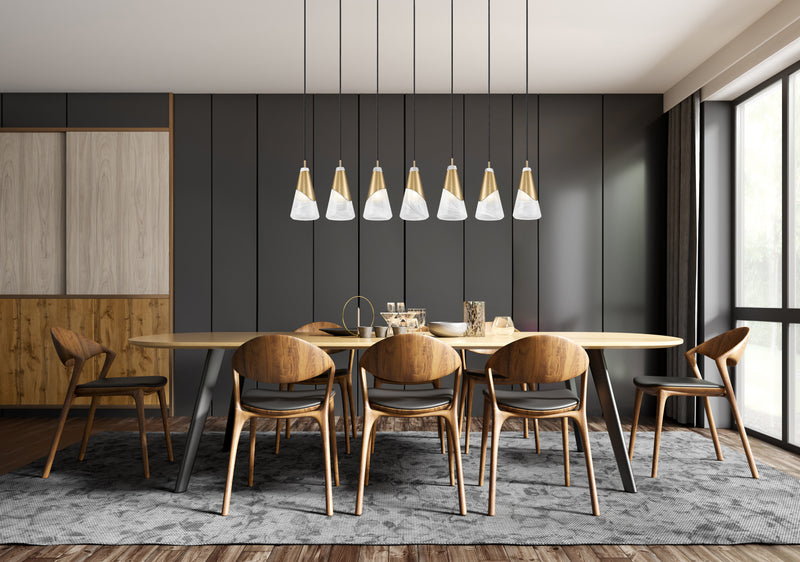 Aimie 7 Light 54" Linear Pendant, 13.25" Tall in Modern Gold in a room setting
