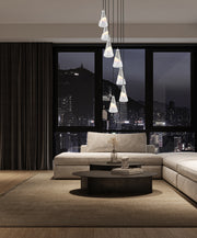 Aimie 7 Light 18" Pendant, 13.25" Tall in Brushed Nickel in a room setting