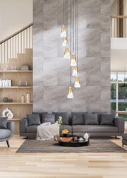 Aimie 7 Light 18" Pendant, 13.25" Tall in Modern Gold in a room setting