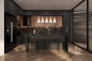 Aimie 5 Light 42" Linear Pendant, 15.75" Tall in Modern Gold in a room setting