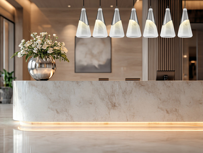 Aimie 7 Light 54" Linear Pendant, 15.75" Tall in Brushed Nickel in a room setting