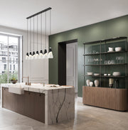 Aimie 7 Light 54" Linear Pendant, 15.75" Tall in Matte Black in a room setting