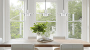 Ludo 3 Light 52" Linear Pendant in Brushed Nickel in a room setting