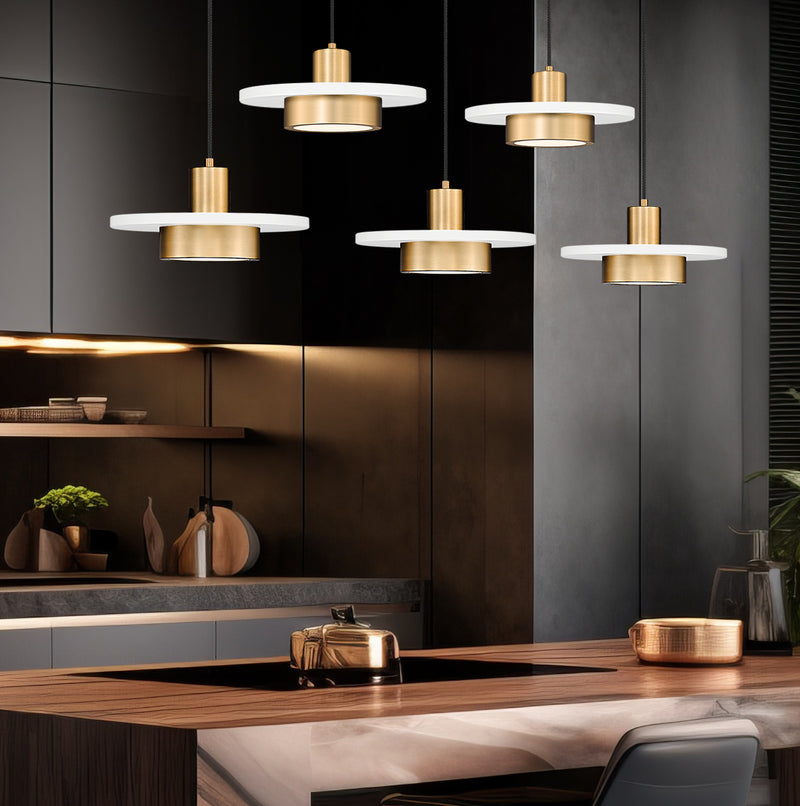Ludo 5 Light 51.5" Linear Pendant in Matte White + Modern Gold in a room setting